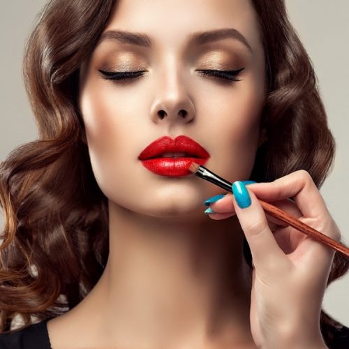 make-up-artist-is-working-with-face-of-gorgeous-model-cosmetic-and-picture-id924985612